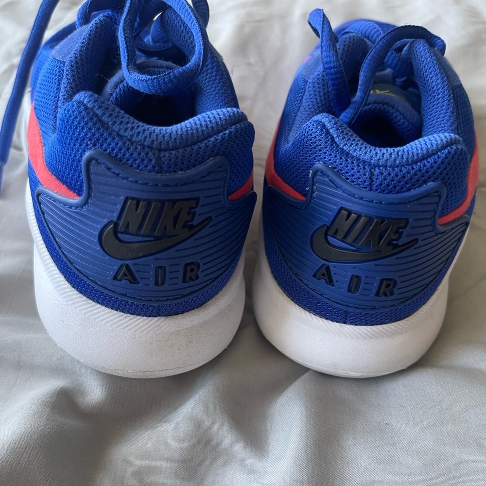 Blue and Orange Nike. Worn for a couple of hours.
